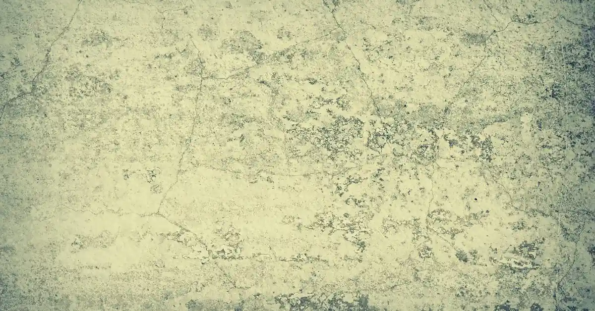 Bare gray concrete wall texture showing a solid, unpainted surface