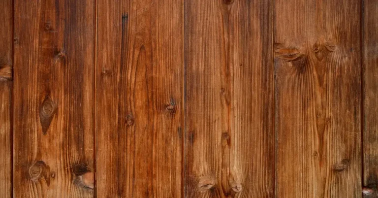 Warm brown stained wood planks with visible knots and grain