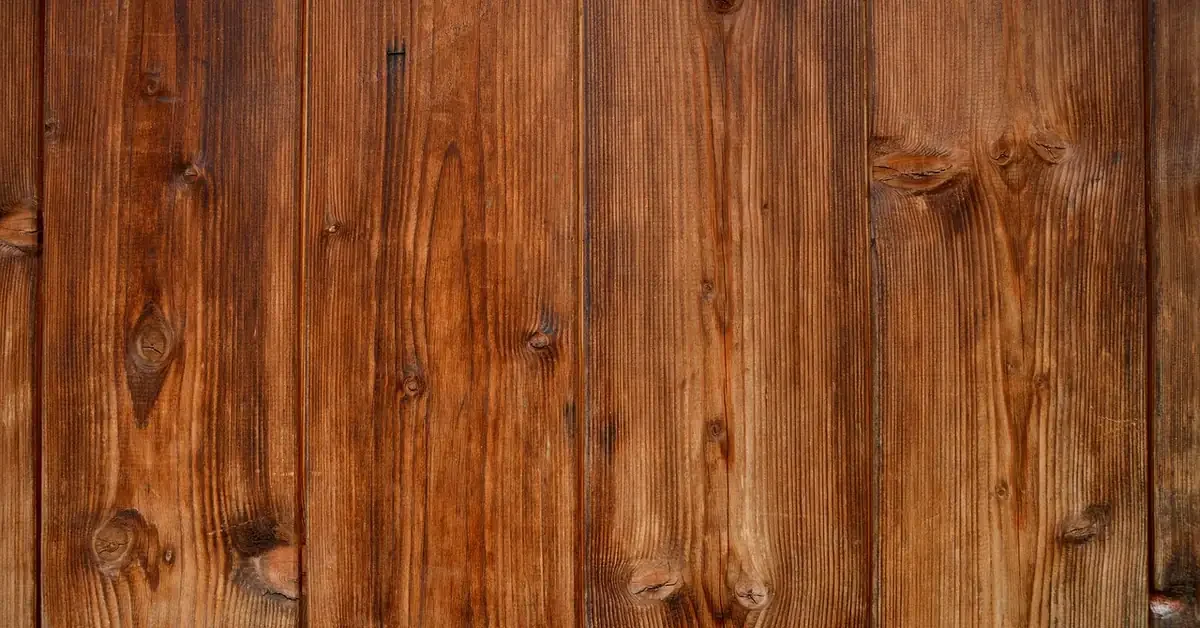 Warm brown stained wood planks with visible knots and grain