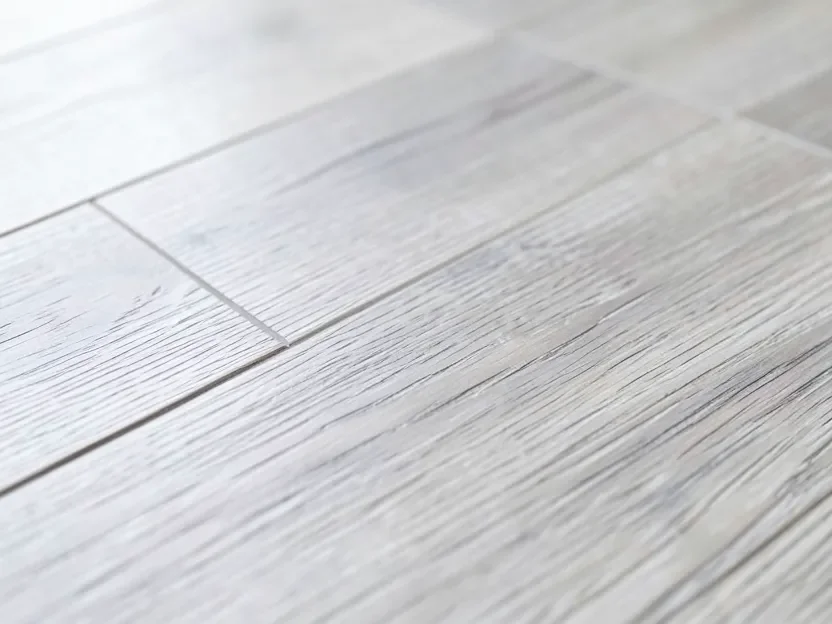 Close-up of grey whitewashed oak hardwood flooring showing natural wood grain