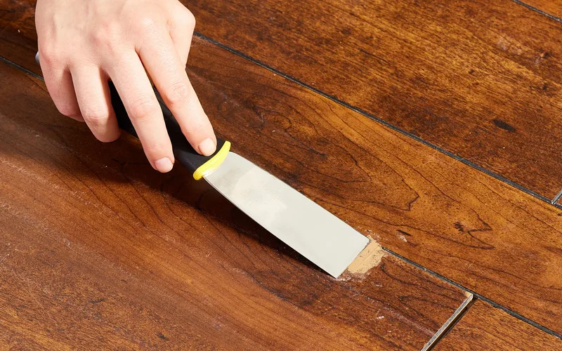 Hardwood floor surface after a scuff mark has been buffed out