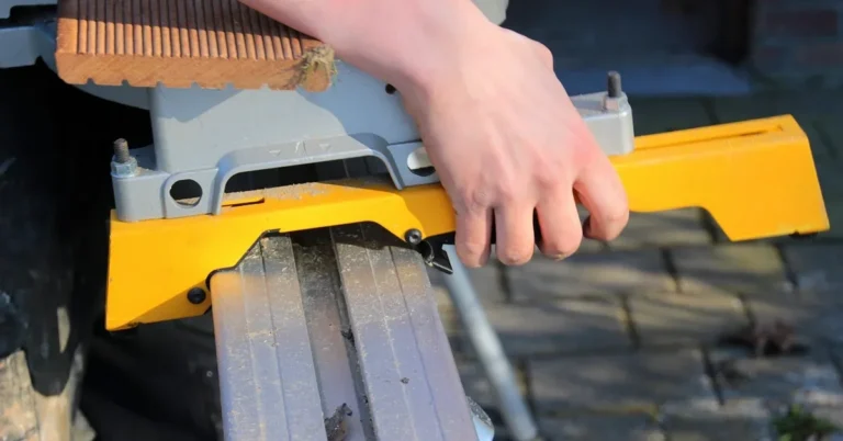 Miter saw with extension work support while cutting a board