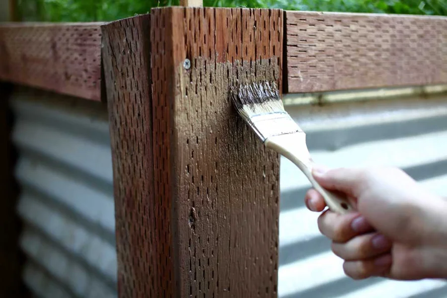 How Long to Wait before Painting Pressure Treated Lumber: Expert Tips