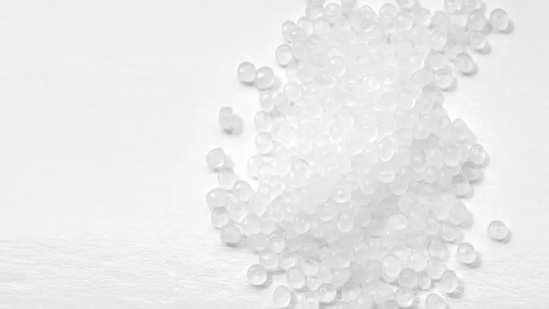 Pile of raw TPU plastic pellets used to manufacture thermoplastic polyurethane products