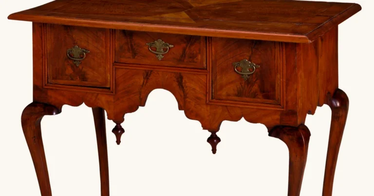 Antique side table with bookmatched walnut veneer top and drawer fronts