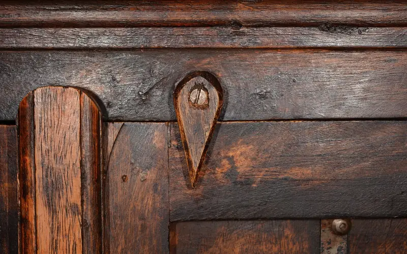 antique wood furniture with an aged finish before deglossing and shellac sealant application antique wood furniture with an aged finish before deglossing and shellac sealant application