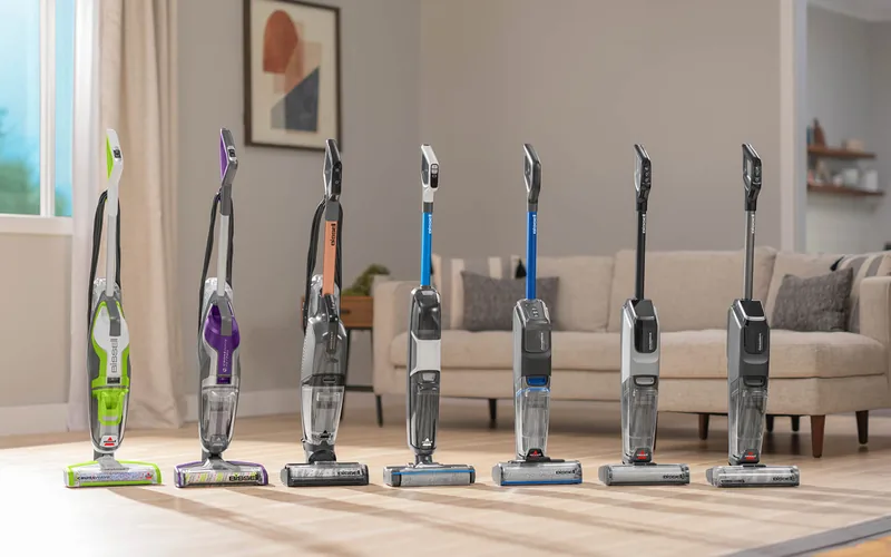 Lineup of Bissell CrossWave and SpinWave hard-floor models standing on a wood floor