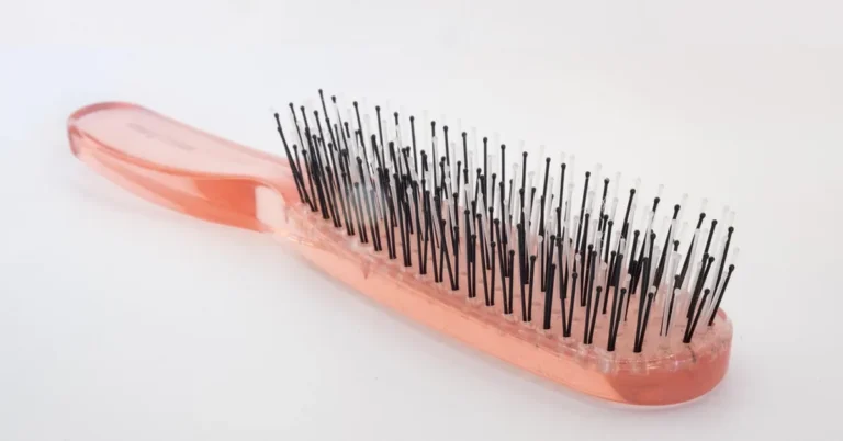 close-up of natural bristles on a hairbrush before cleaning