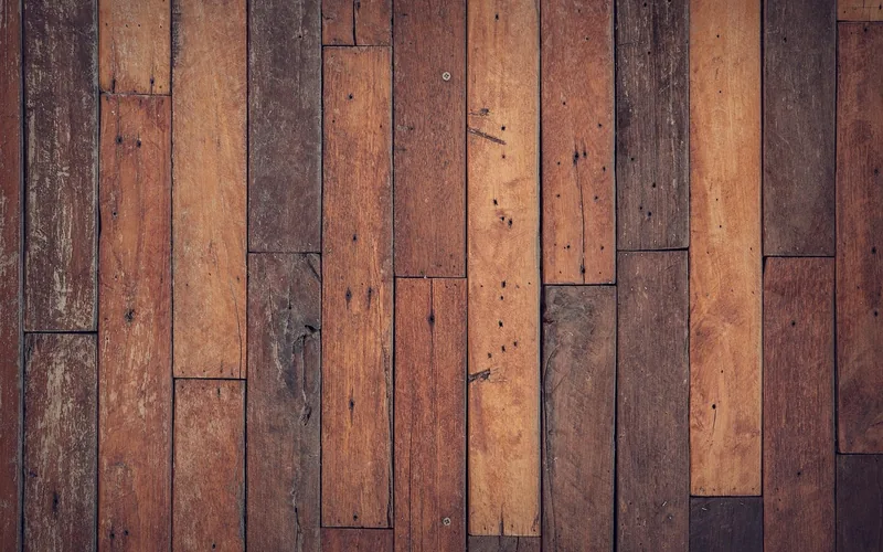 close-up of engineered wood plank flooring showing seams and grain