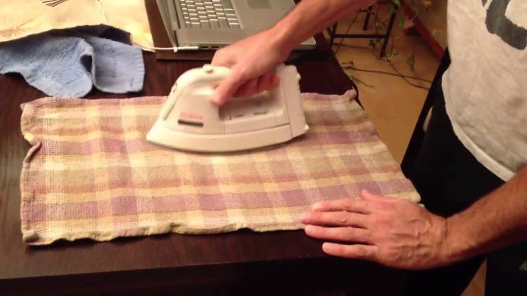 How to Remove Water Stains from Wood With an Iron