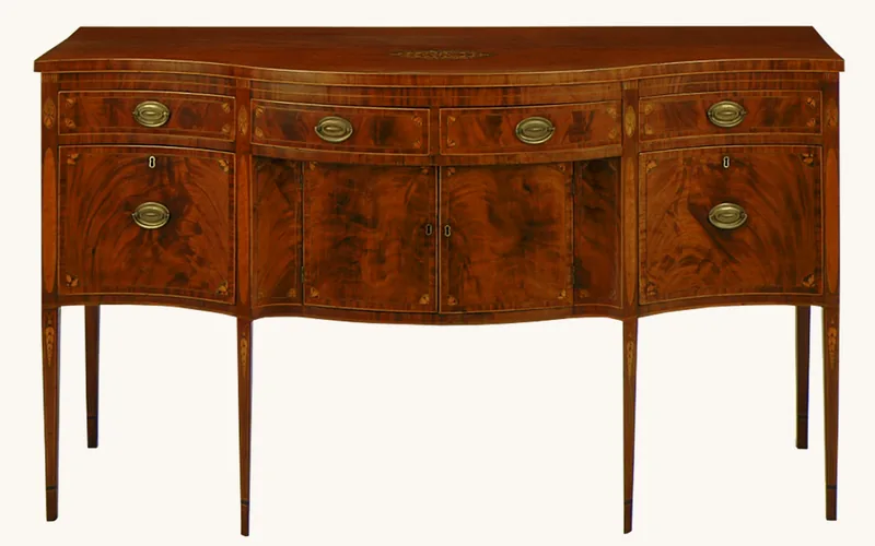 Mahogany veneer sideboard showing bookmatched grain pattern typical of furniture veneer Mahogany veneer sideboard showing bookmatched grain pattern typical of furniture veneer