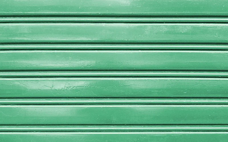 Freshly painted green metal exterior door