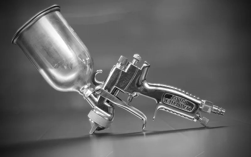 spray gun tool used for applying coatings in a workshop setting spray gun tool used for applying coatings in a workshop setting