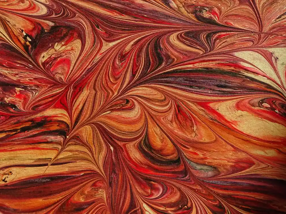 Marbled paper showing wave and arabesque pattern from water marbling