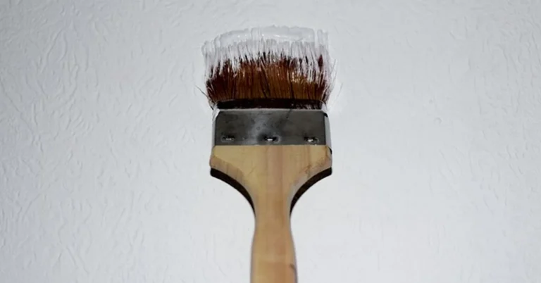 House painter applying wall paint with a bristle brush, alternatives to Purdy paint brushes