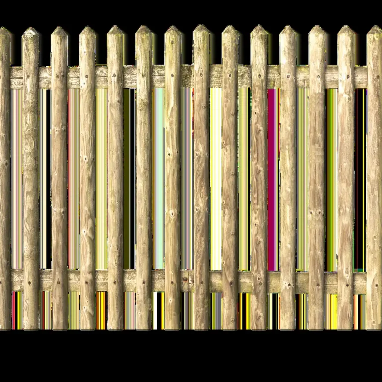 Weathered wood privacy fence panels in need of cleaning