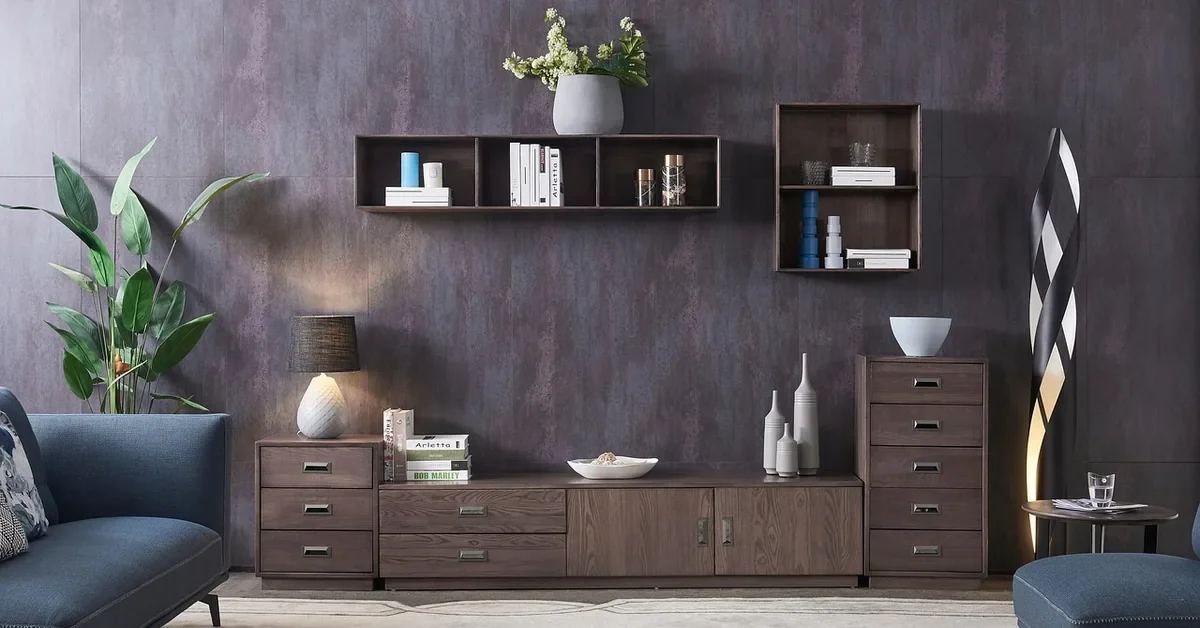 Two wooden floating wall shelves above a low cabinet in a living room