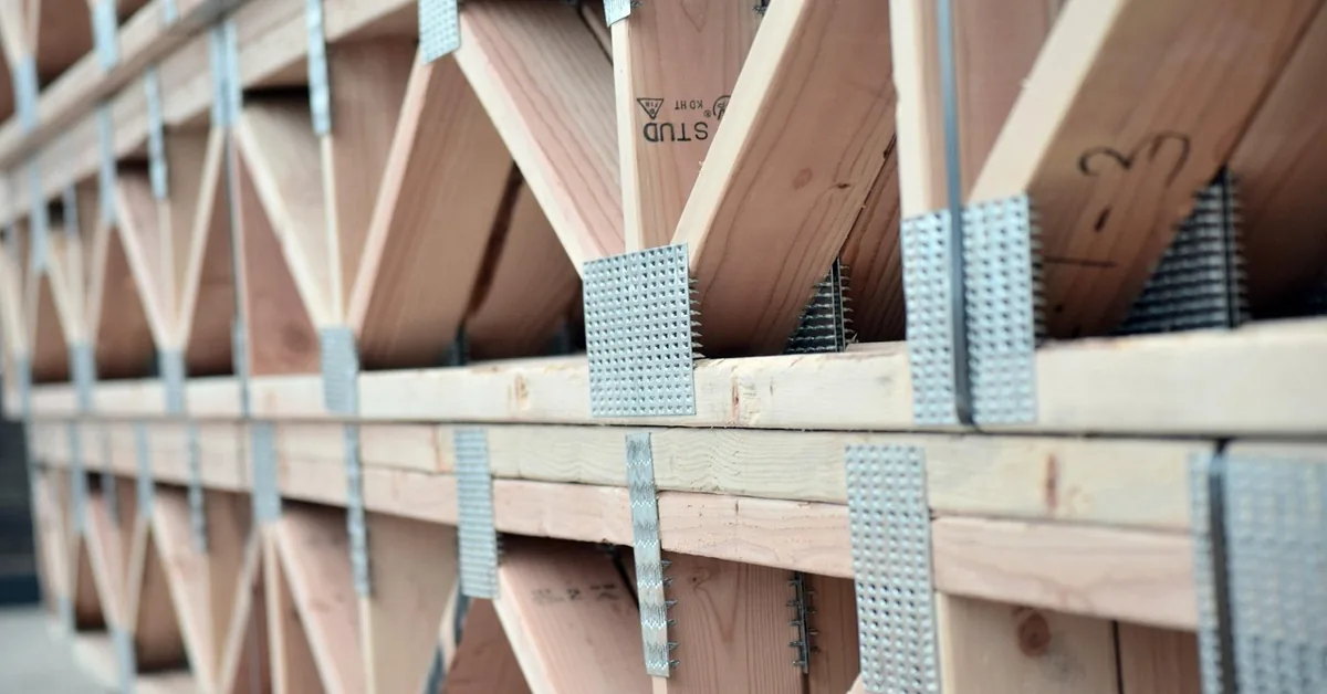 wood floor joist trusses installed during residential framing construction
