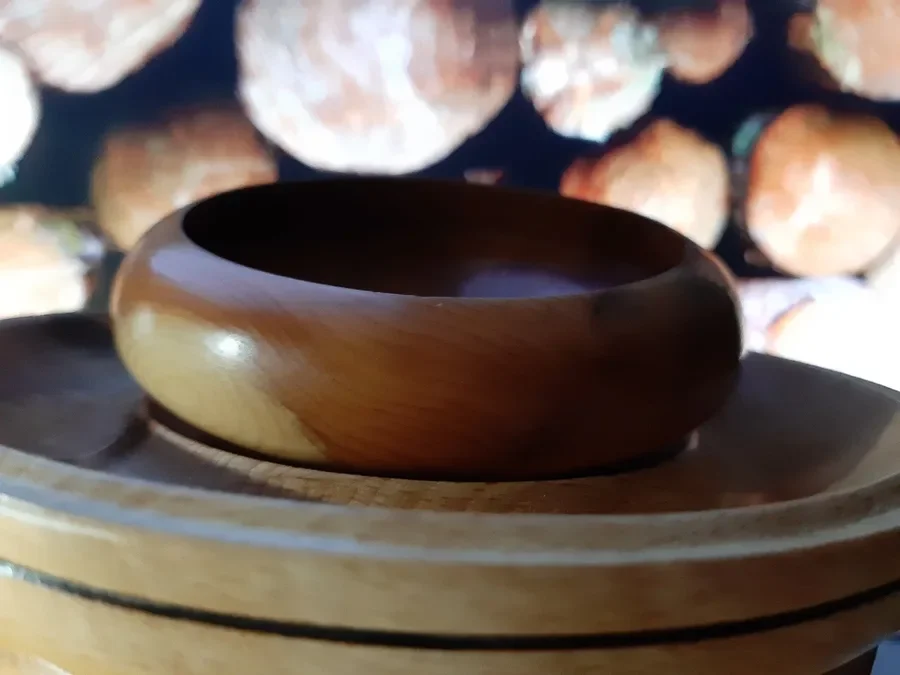 Small turned wooden bowl with a smooth clear finish