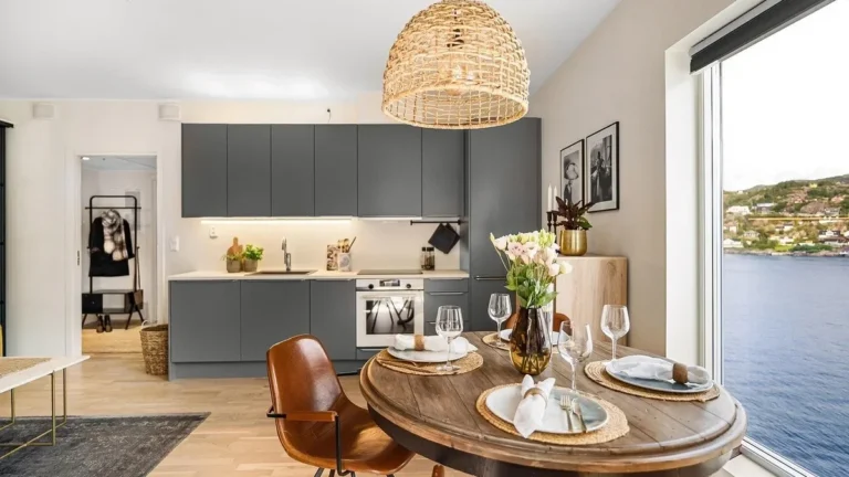 Wooden dining table with chairs in a bright modern home dining nook
