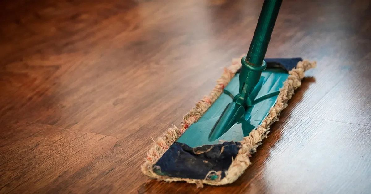 Microfiber mop cleaning a hardwood floor