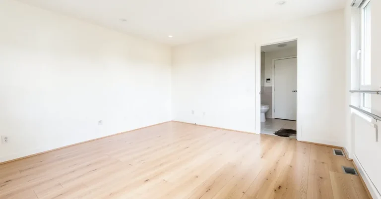 Clean light hardwood floor in a bright room