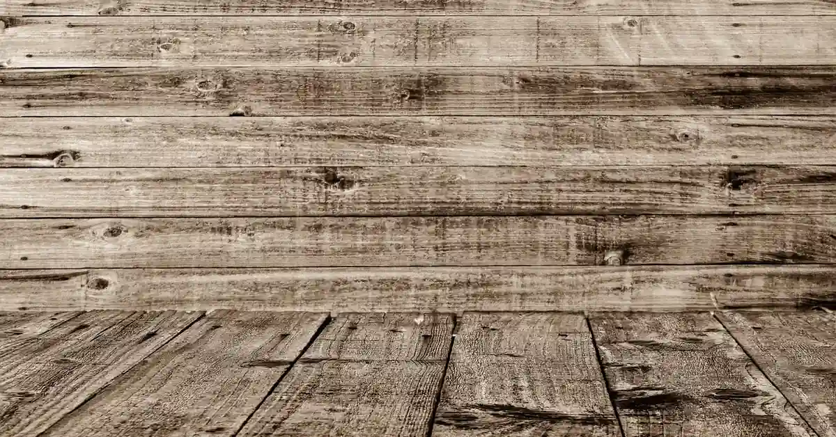 Hardwood flooring gaps between boards on a wood plank floor