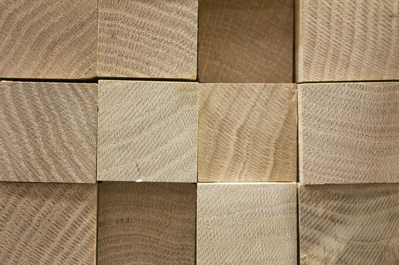 close-up end-cut view of solid wood boards showing natural grain pattern close-up end-cut view of solid wood boards showing natural grain pattern