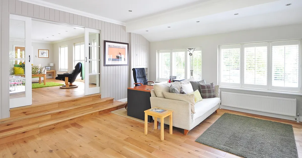 bright living room with a sealed oak hardwood floor