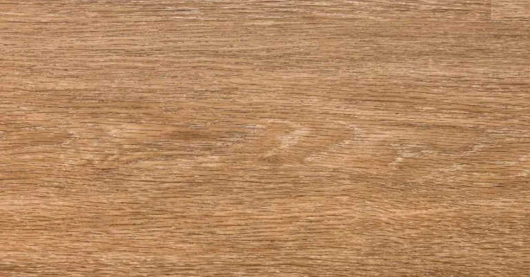 Close-up of ash wood laminate flooring plank showing realistic wood grain texture