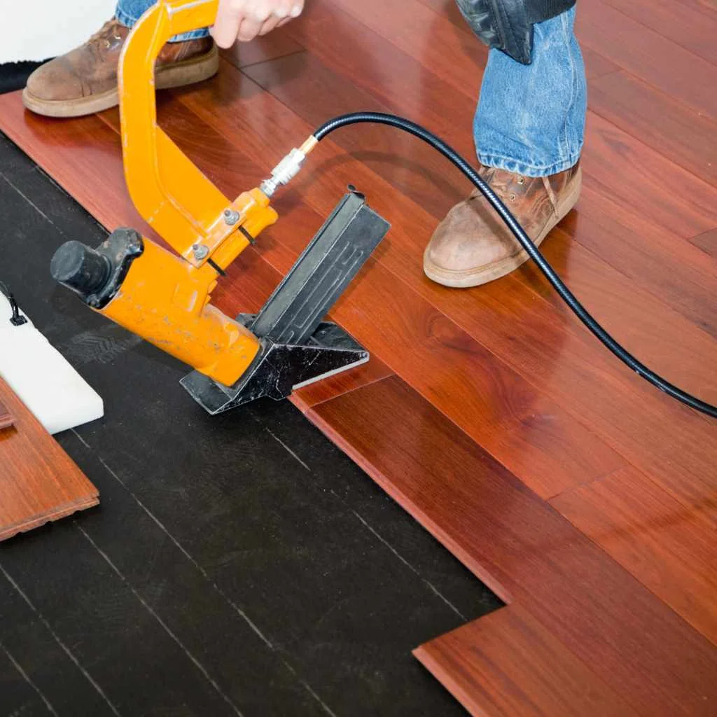 Felt paper underlayment under nail-down hardwood flooring installation