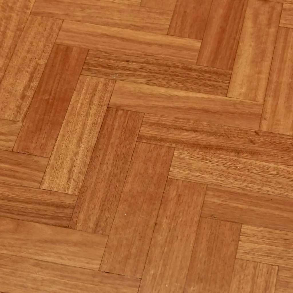 Herringbone-pattern hardwood floor with dense reddish-brown wood grain