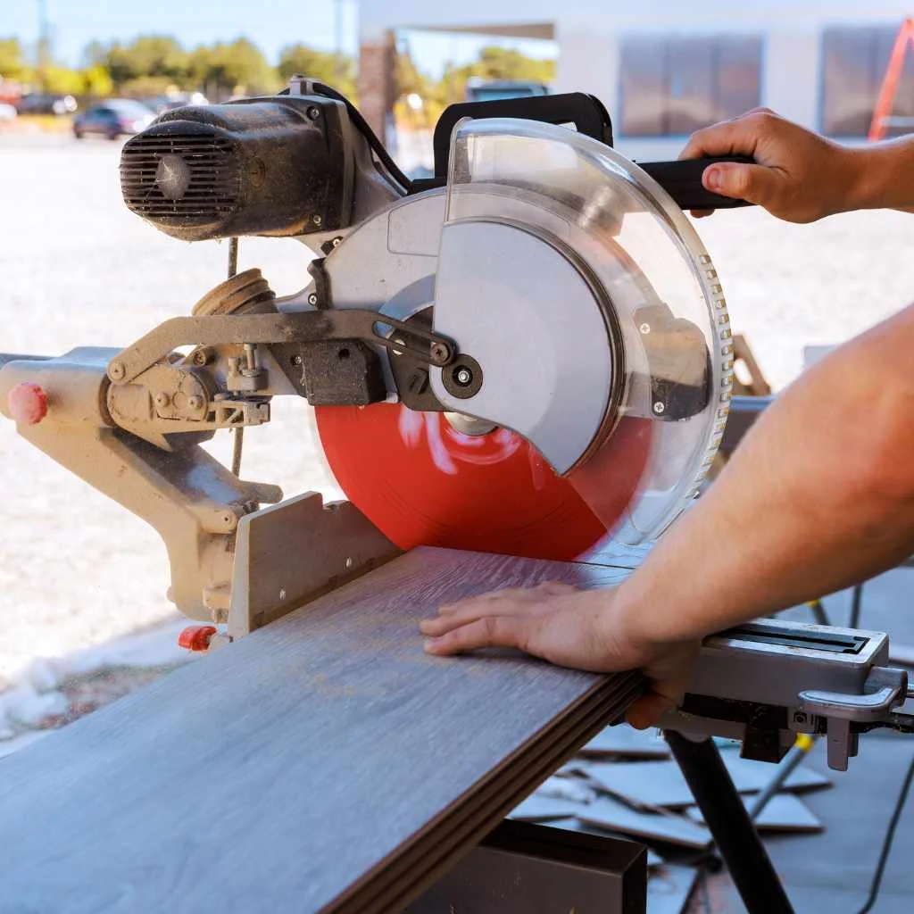 A miter saw making a precise crosscut