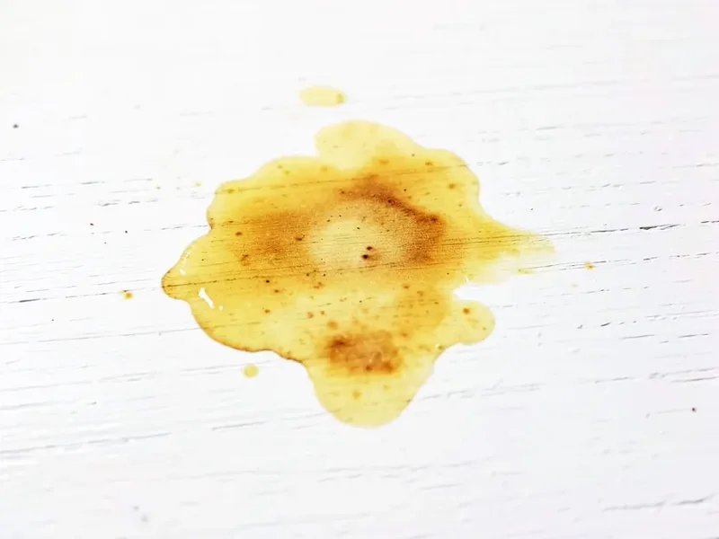 Wood stain bleeding through a fresh coat of white paint without a stain-blocking primer