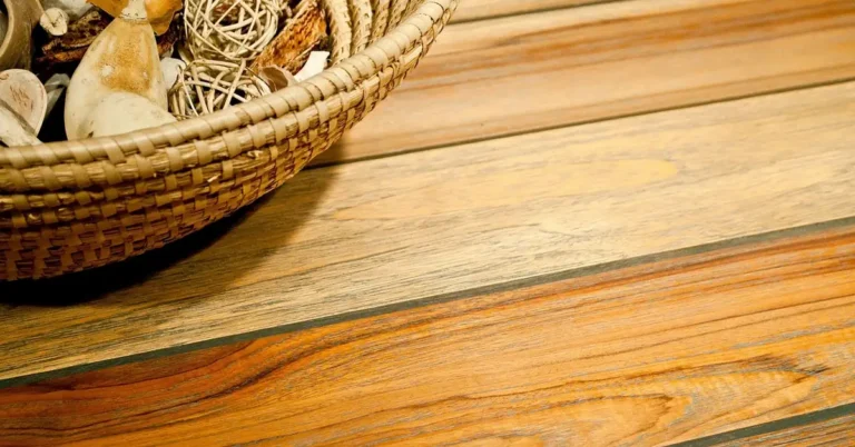 Close-up of golden-brown teak planks showing natural grain and color variation