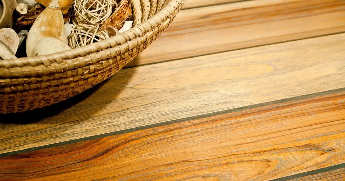 Close-up of golden-brown teak planks showing natural grain and color variation