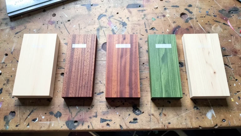 Wood samples of cedar, redwood, teak, and cypress used for termite-resistant projects
