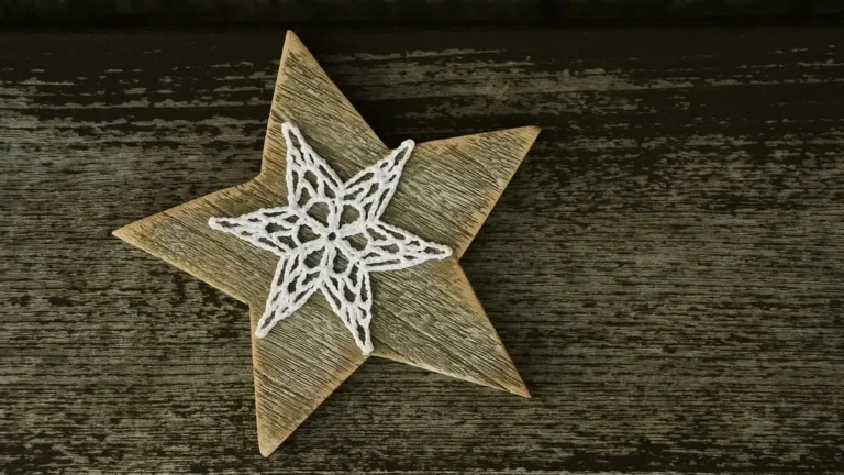 Wooden Christmas star decoration on weathered wood boards
