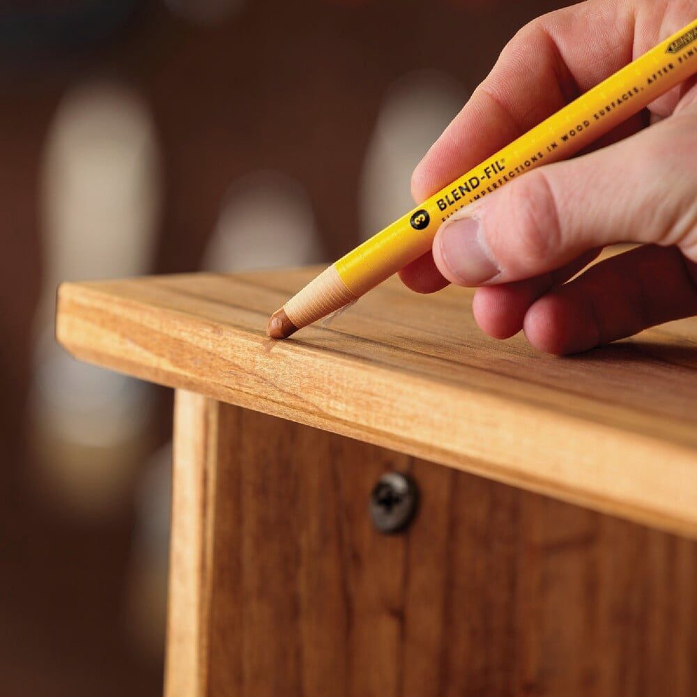 Minwax Blend-Fil No. 2 wood repair stain pencil being used on wood corner