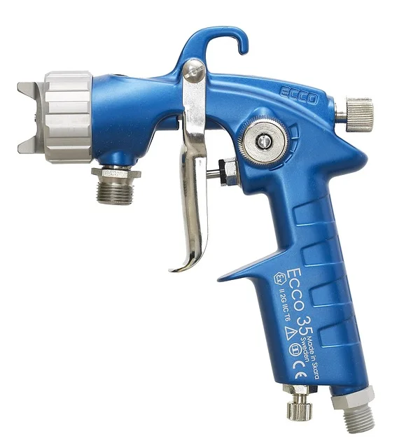 HVLP spray gun body showing fluid nozzle and air inlet fittings
