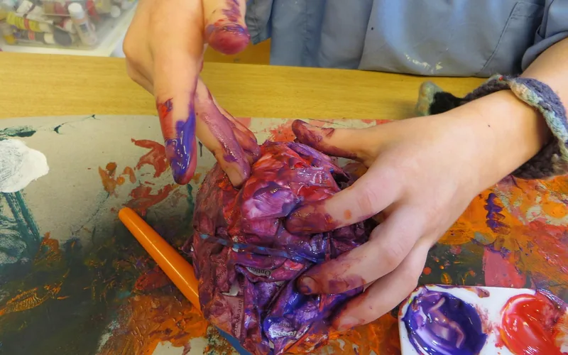 Hands covered in paint before cleaning