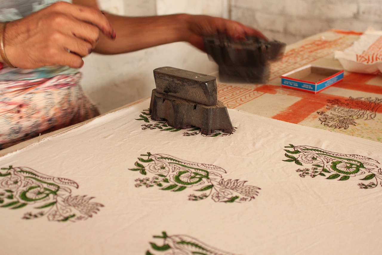 woodblock printing tools including brayer roller and carving gouges for block printing