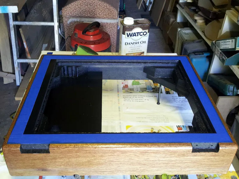 Danish oil being applied as a finish to a wood project