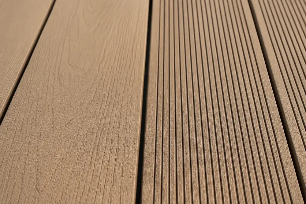 Side-by-side comparison of smooth wood-grain deck boards and grooved deck boards