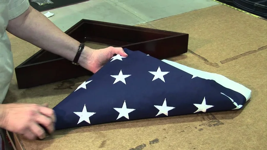 how to fold a flag for display case video guide