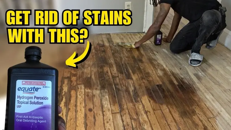 Wearing gloves and a mask as a safety precaution when applying oxalic acid wood bleach to a stained wood floor