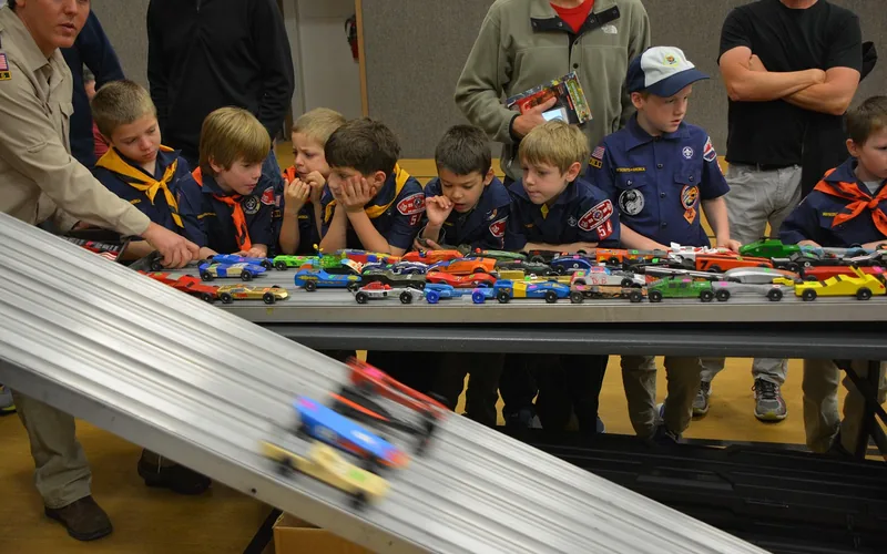 Hand-built wooden pinewood derby car ready for painting and weight placement