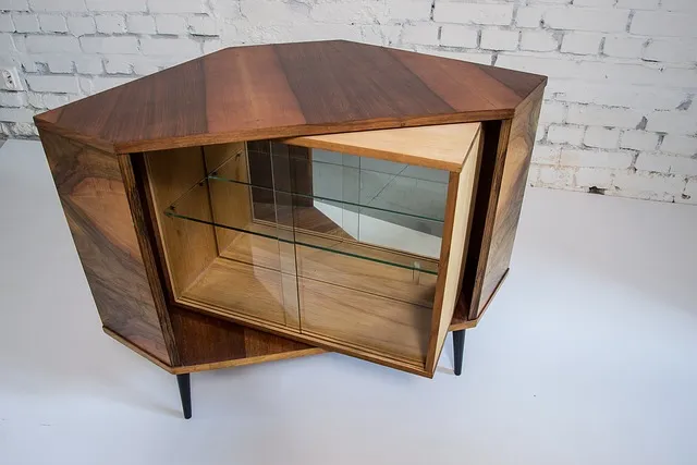 Mid-century wood cabinet with a restored, glossy finish