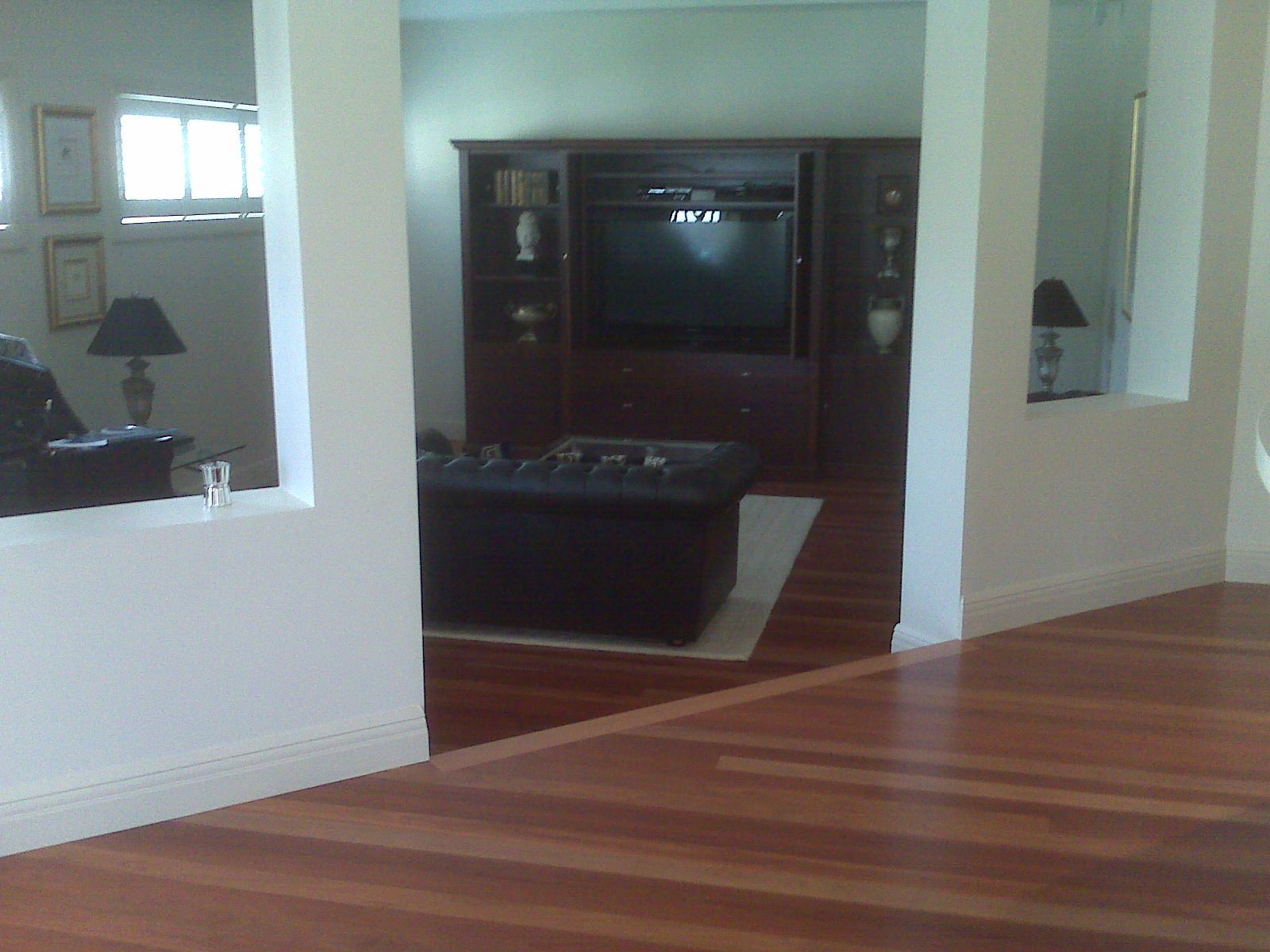 Close-up of solid tongue-and-groove hardwood strip flooring, the same board profile repurposed for DIY countertops