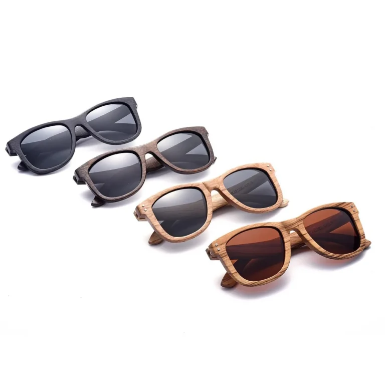 Four pairs of wood sunglasses in different natural wood tones showing how wood finish affects color and grain